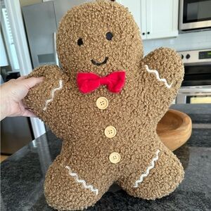 cupcakes & cashmere Brown Gingerbread Plush Holiday Pillow with Red Bow
